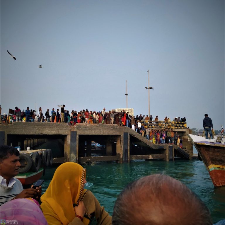 Passengers waiting for a boat at okha jetty