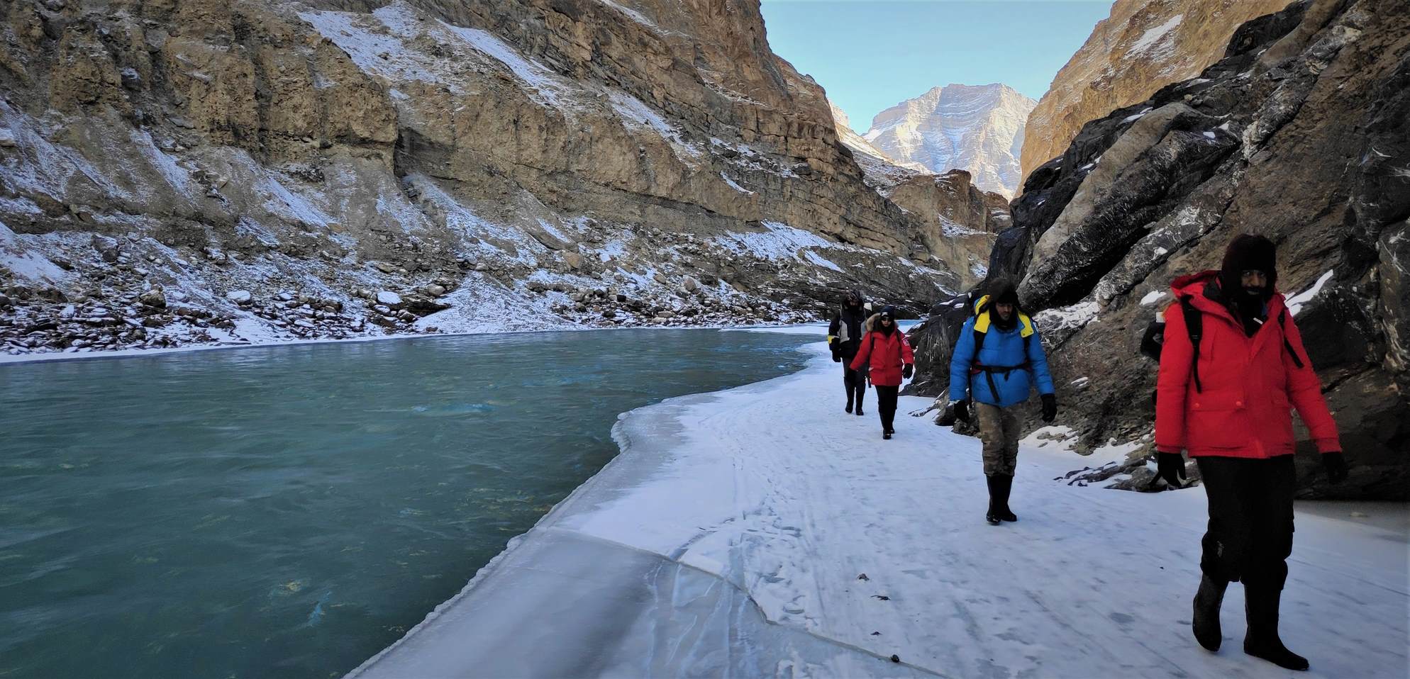 People trekking on Chadar trek on Frozan Zanskar River