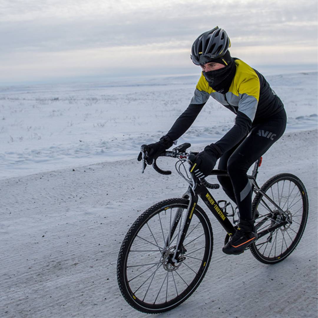 Man doing Regular Cycling on beach